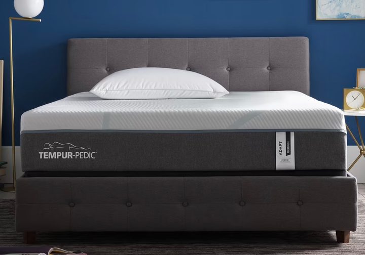 A Tempur-Adapt mattress with a bed frame.