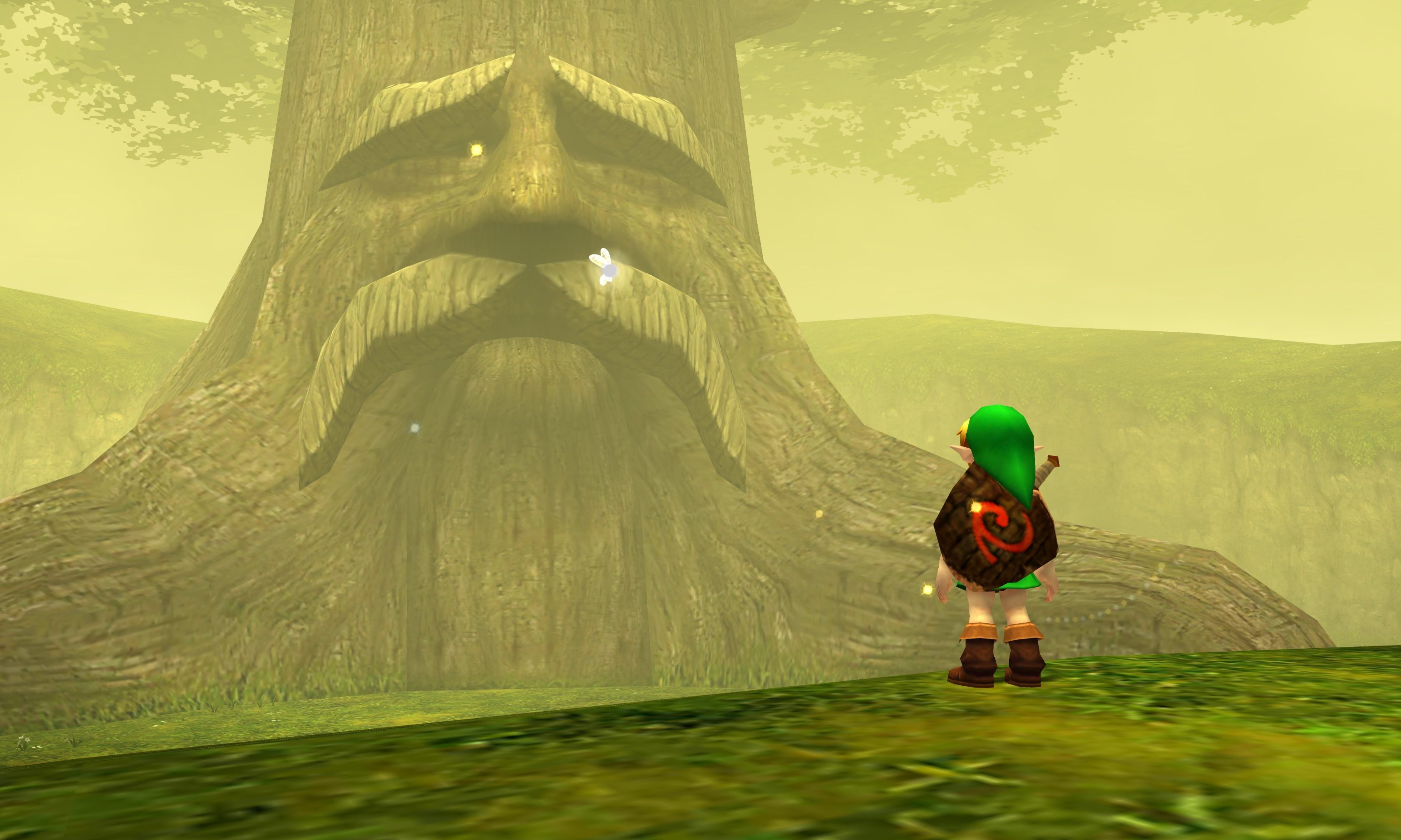 Link stands in front of the Deku Tree in The Legend of Zelda: Ocarina of Time.