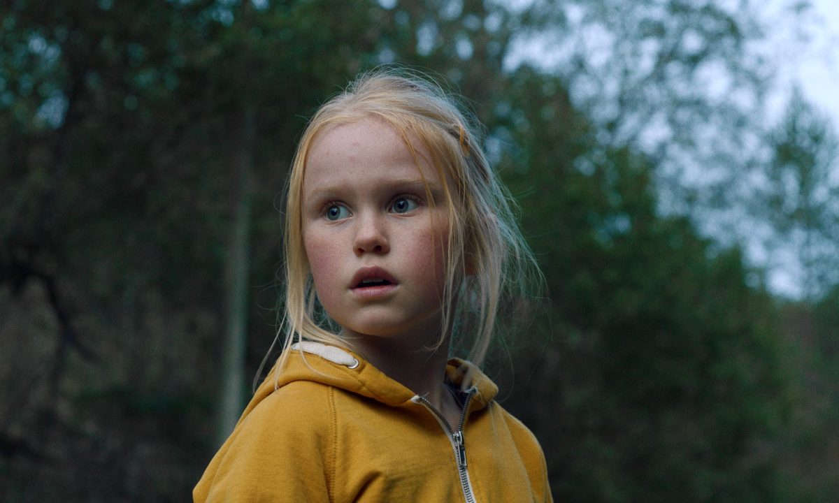 Rakel Lenora Fløttum looks uncertain in the woods.