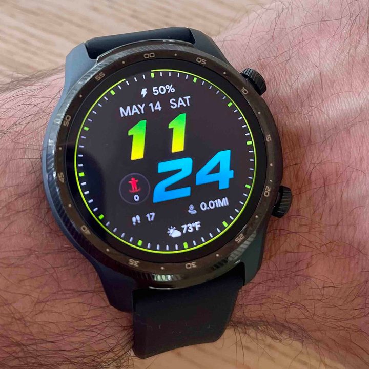 A man wears a A TicWatch Pro 3 Ultra on his left wrist.