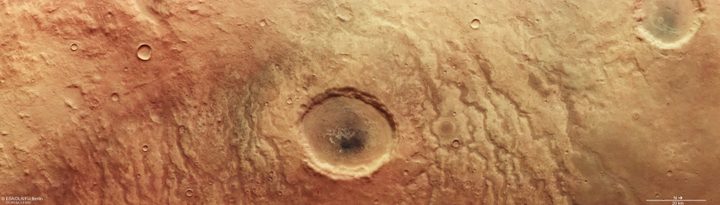 This image from ESA’s Mars Express shows part of the scarred and colourful landscape that makes up Aonia Terra, an upland region in the southern highlands of Mars.