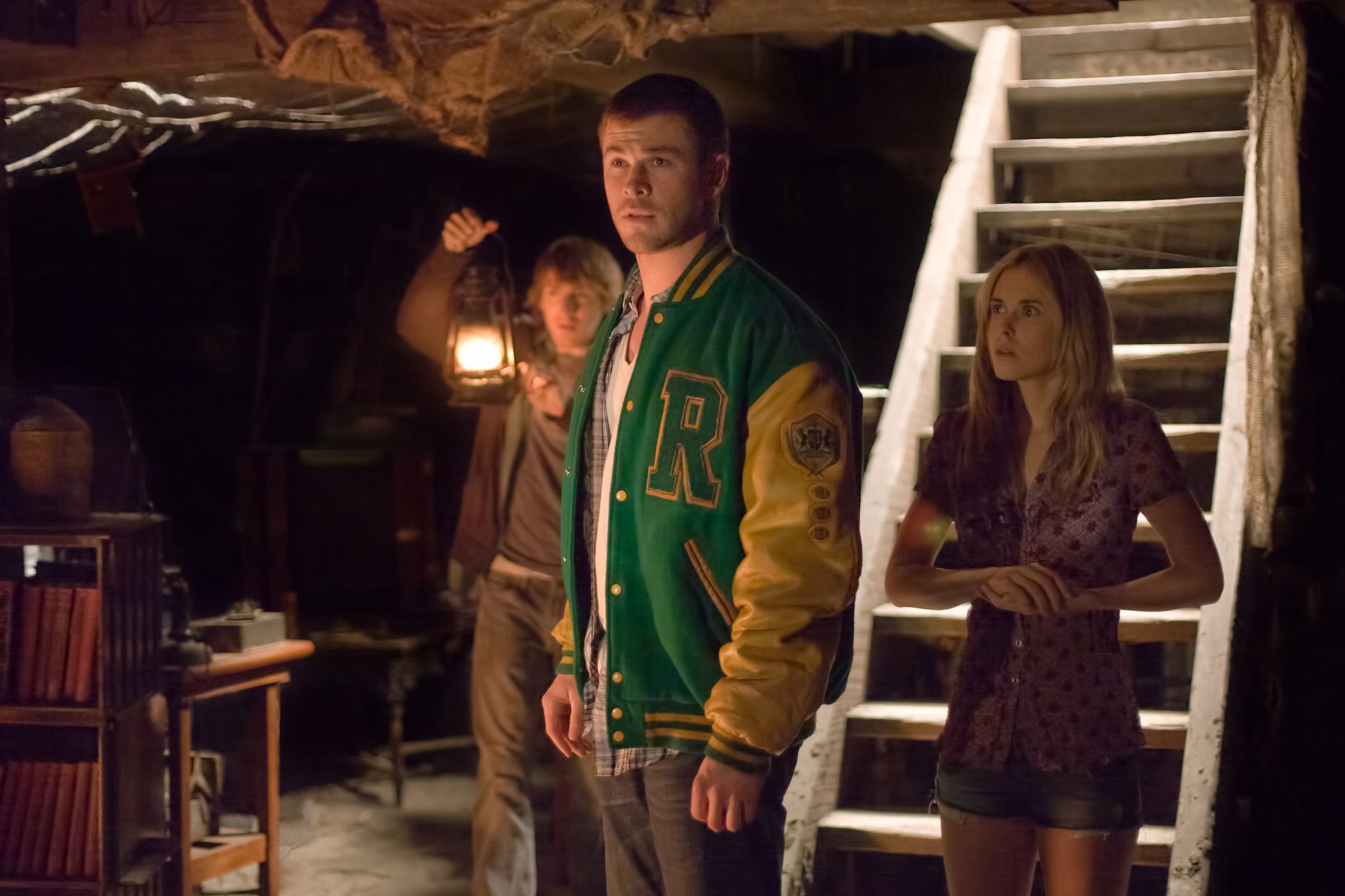 The characters from Cabin in the woods at the bottom of a basement stairwell