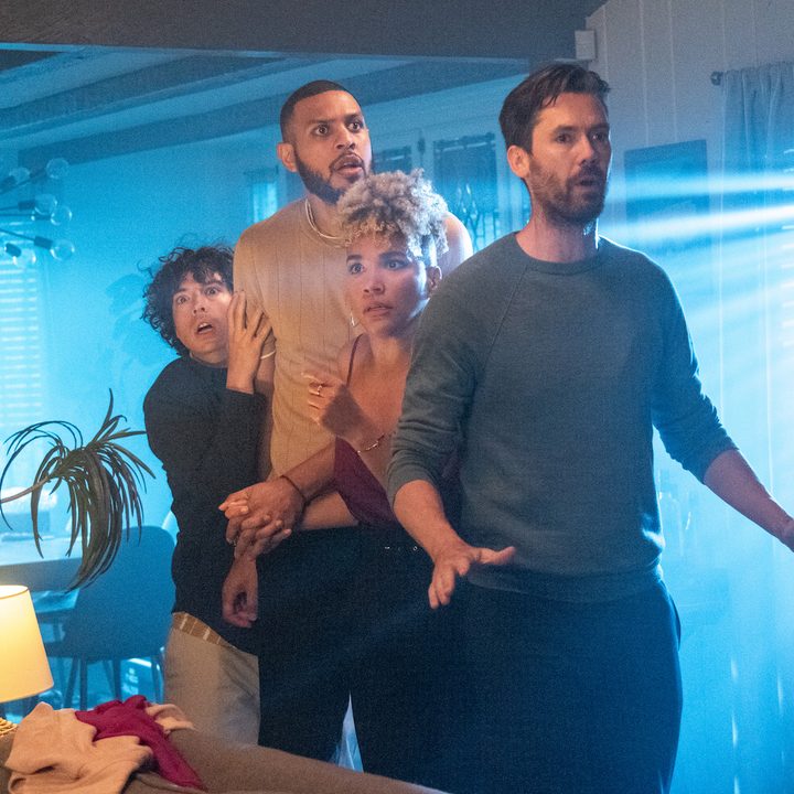 Cliff, Troy, Sam , and Paul stand in a line and look from a scene in Gatlopp.