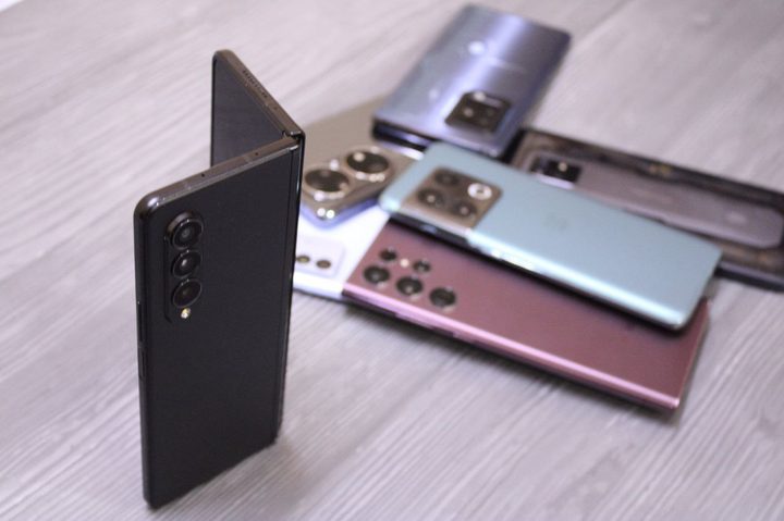 Galaxy Z Fold 3 and other flagships in the background.