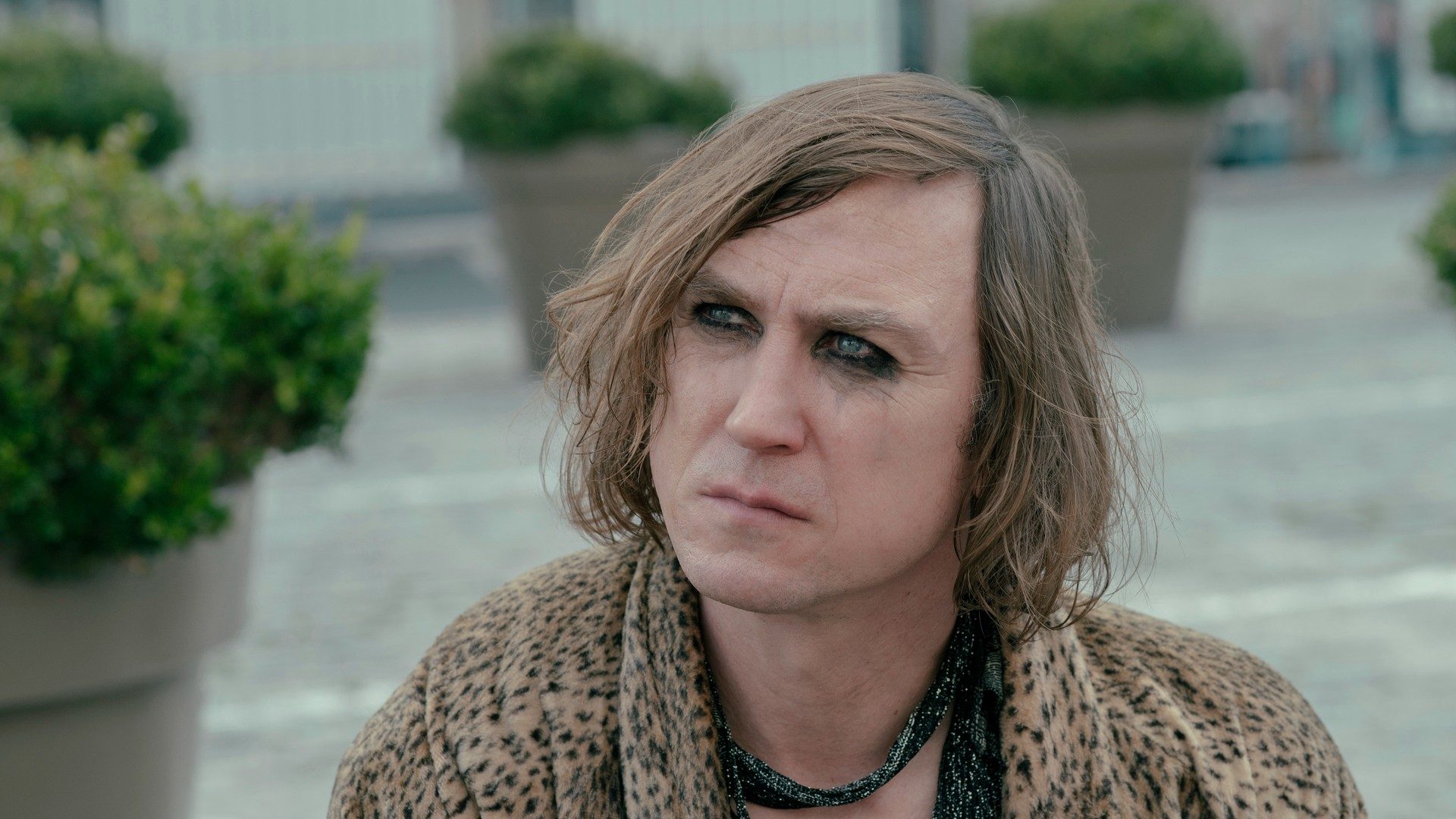 Lars Eidinger looks moody.