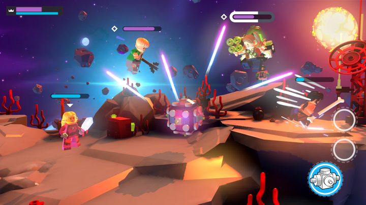 Players fight on the space stage in Lego Brawls.