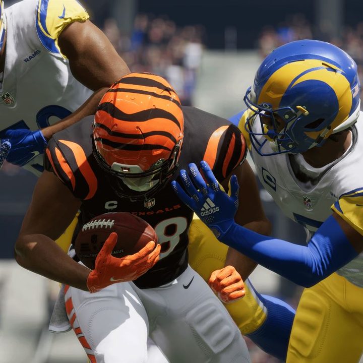 Joe Burrow gets tackled by Chargers players in Madden NFL 23.