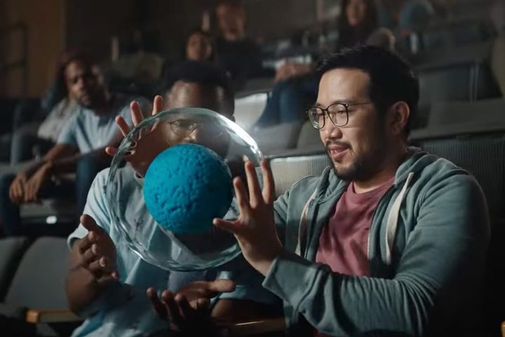 Metaverse Concept From Meta Video Showing Student Holding Biological Cell in their Hands