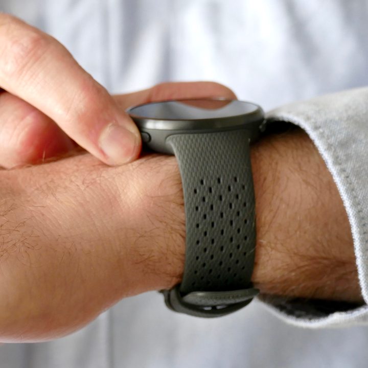 The Polar Pacer Pro being used, worn on a man's wrist.