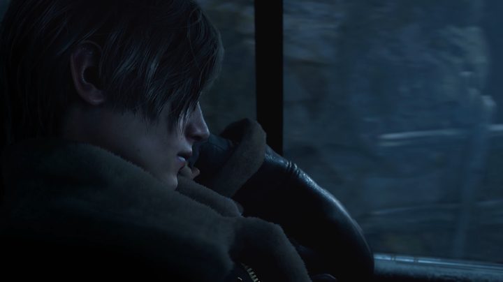 Leon Kennedy in vehicle in the Resident Evil 4 remake.