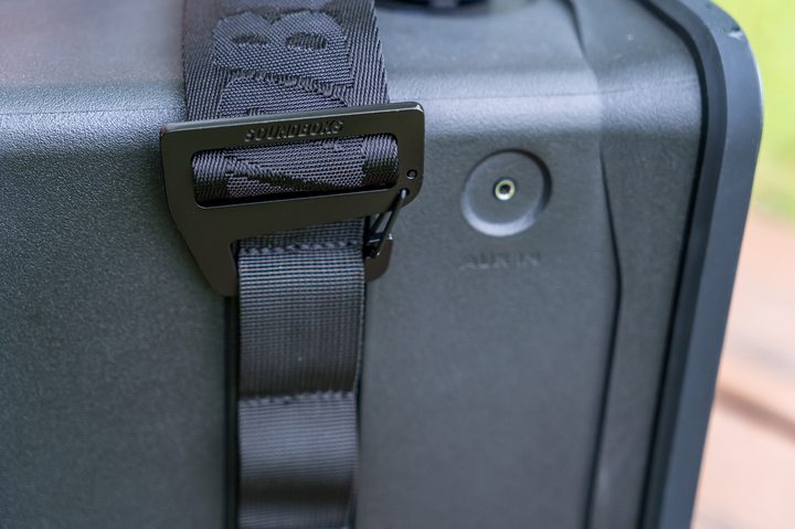 Showing the Aux-In port on the Soundboks Go.