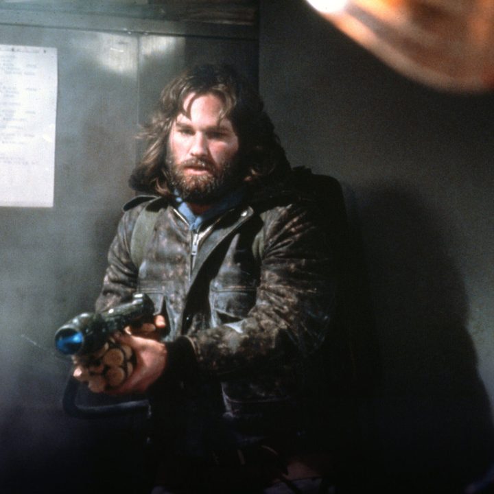 A man holding a flamethrower from the movie The Thing