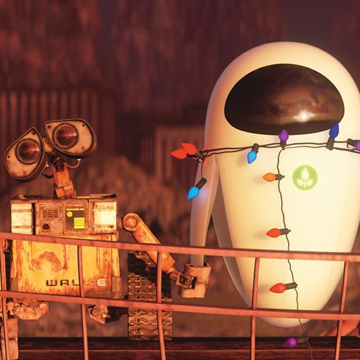 WALL∙E and an inactive EVE holds hands in a scene from the Pixar film Up