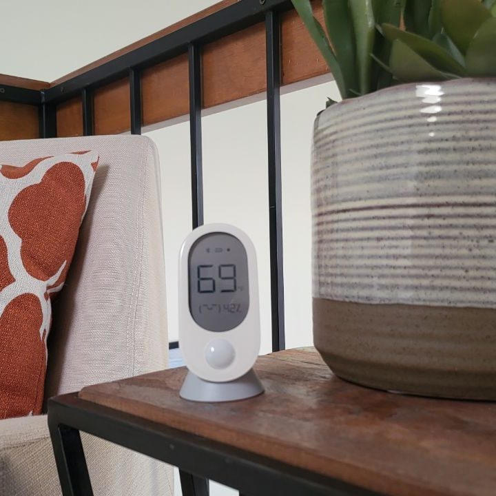 Wyze Room Sensor on a decorative table.