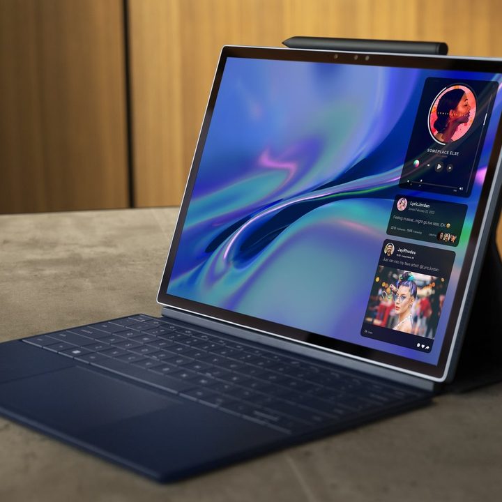 The Dell XPS 13 2-in-1 open on a table.