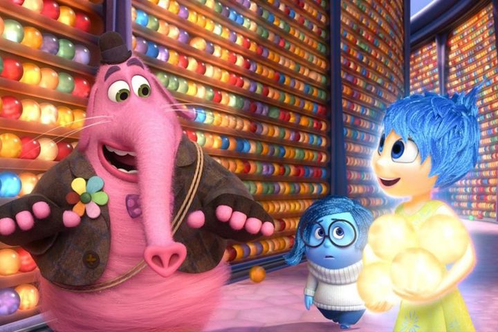 Bing Bong looks at Joy and Sadness in Inside Out.