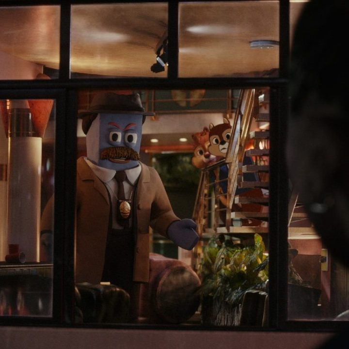 Human character Ellie looks i the window at Captain Putty.