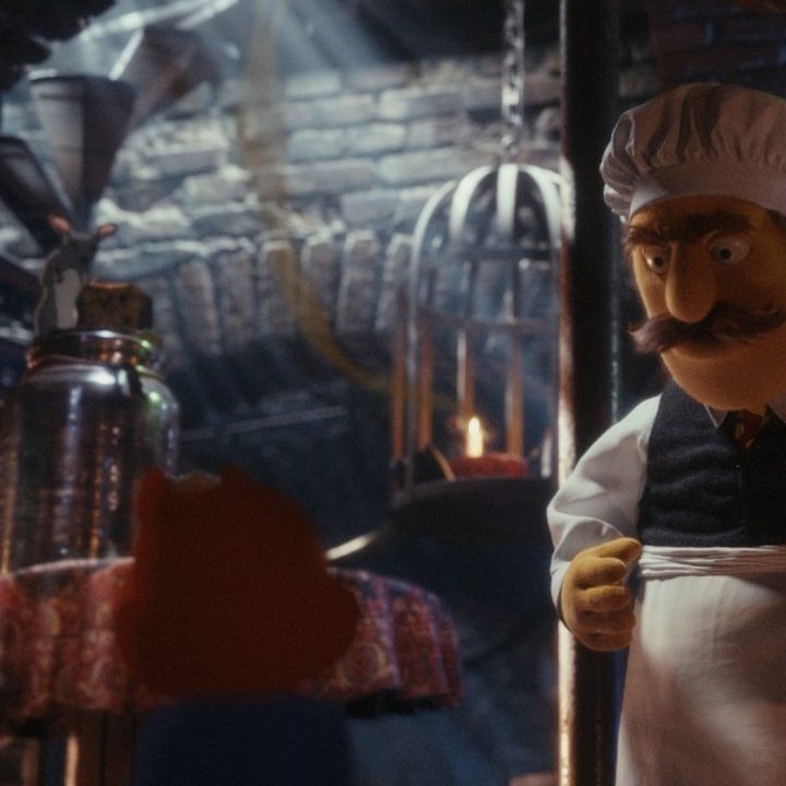 The puppet Bjornson wanders through his kitchen.