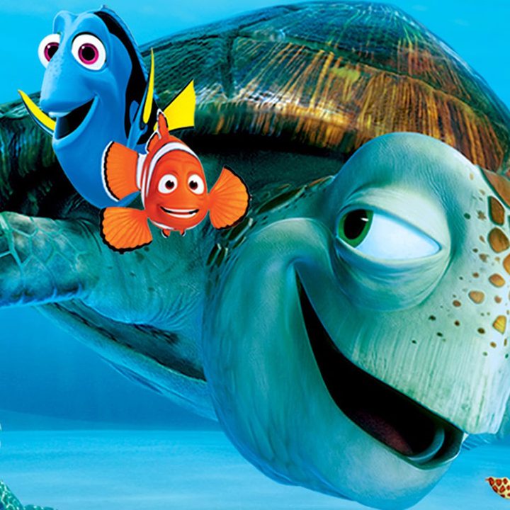 Marlin, Dory, and several turtles pose in promo image for Pixar film Finding Nemo