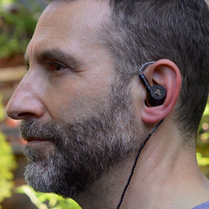 Man wearing the Audeze Euclid in-ear monitors.