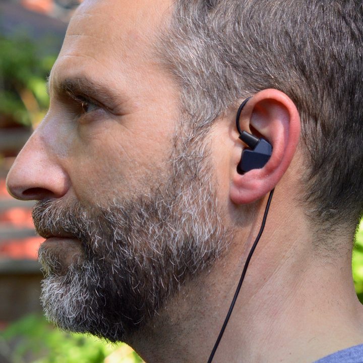 Man wearing the Final Audio A4000 in-ear monitors.