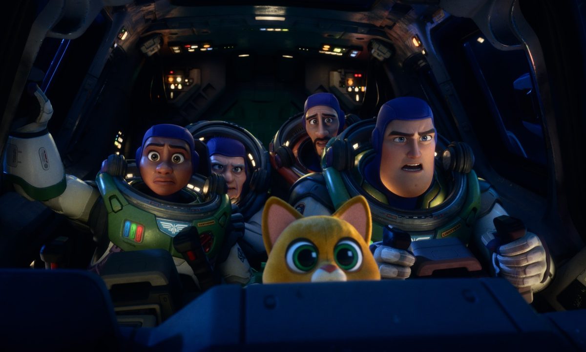 A view inside the cockpit of a crowded ship in Lightyear, with Buzz piloting it.