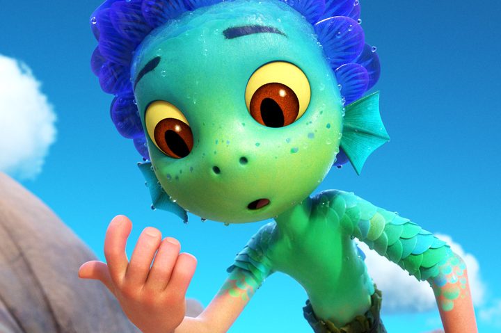 Luca fully transformed with the exception of his hand in Luca (2021).