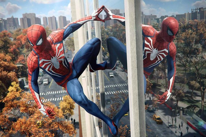 Spider-Man rests on the side of a building in Spider-Man Remastered.
