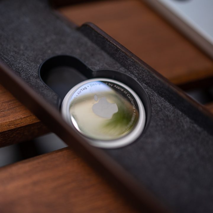 Nomad Apple TV Siri Remote Case with an AirTag installed.