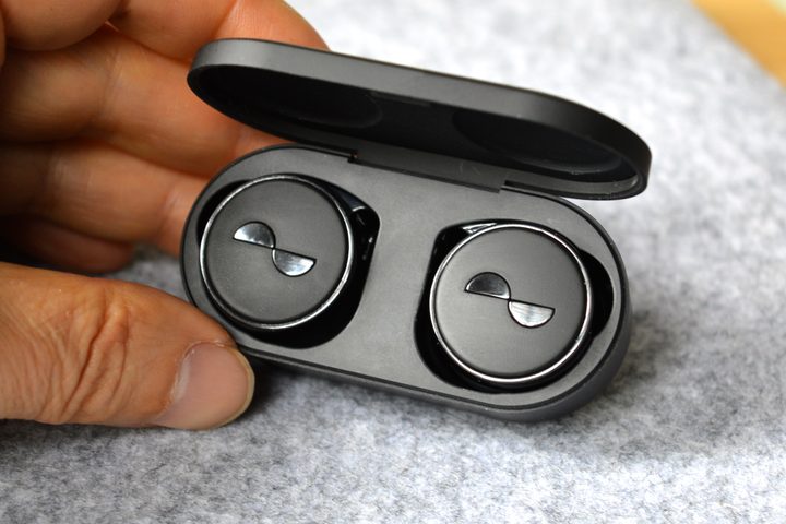 NuraTrue Pro earbuds in charging case.