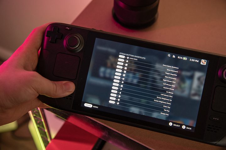 A hand pulling up the Steam Deck shortcuts.