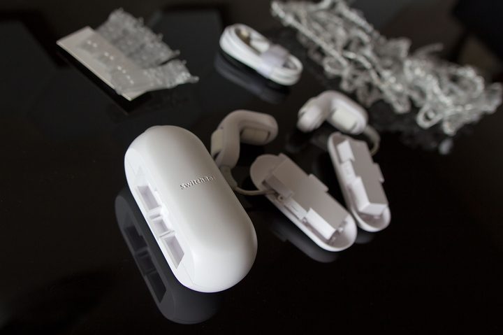 SwitchBot Curtain box content splayed on a table.