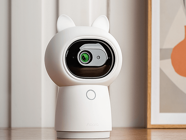 Aqara Camera Hub G3 on counter protecting a home.