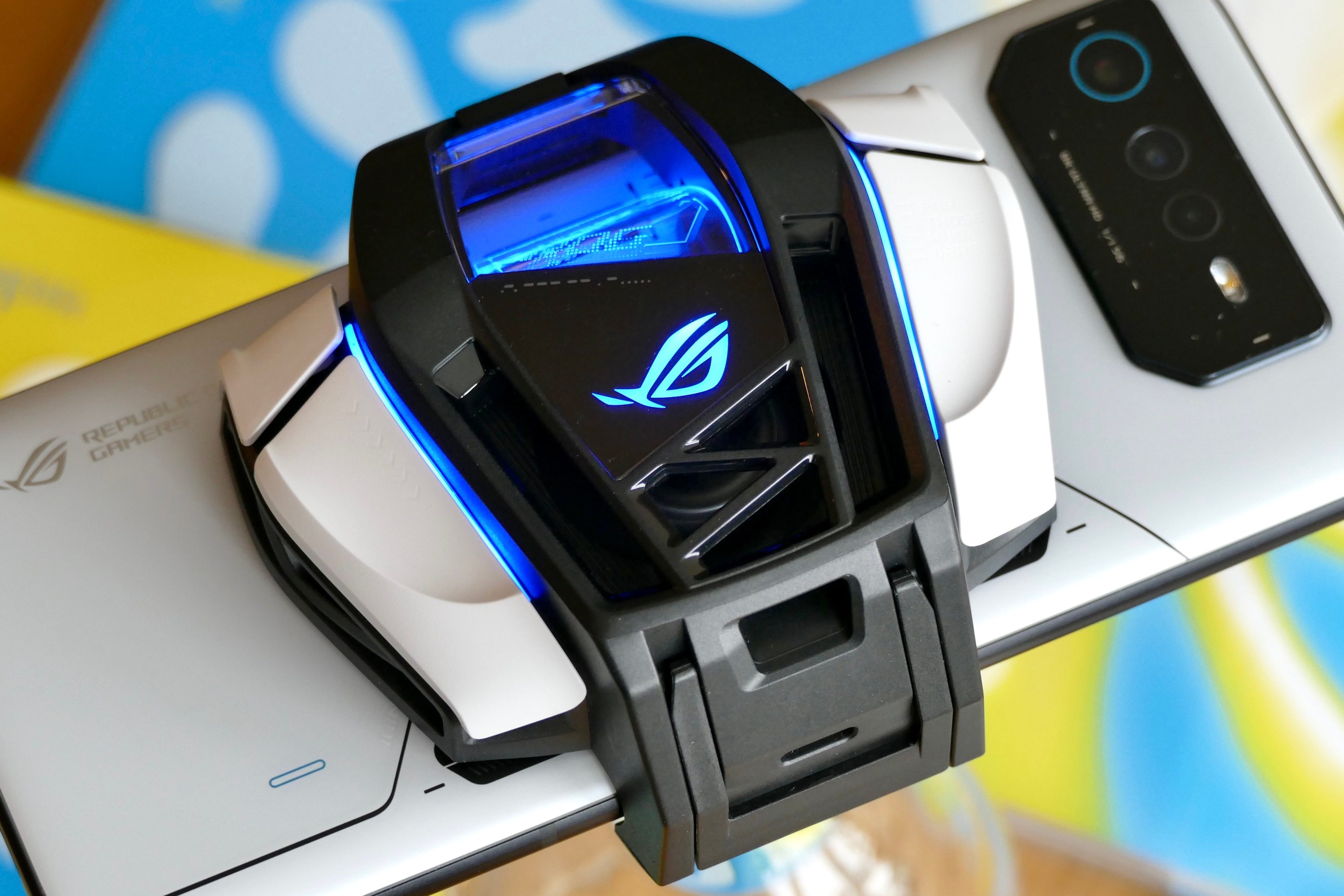 The Asus ROG Phone 6 with AeroActive Cooler 3 lit up.