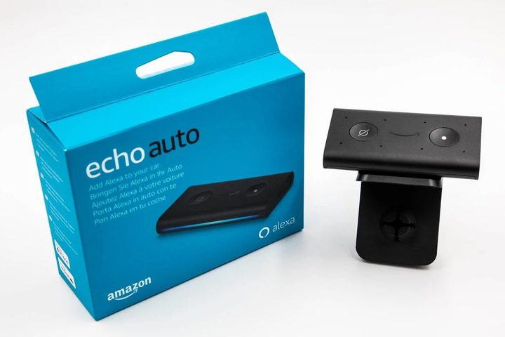 Echo Auto box and device on white background.