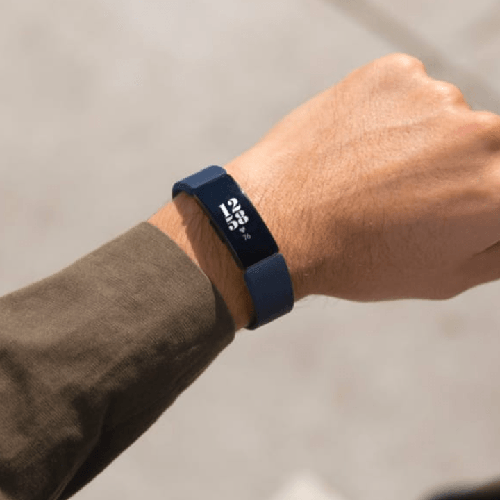 A person wears the Fitbit Inspire 2 on their wrist.