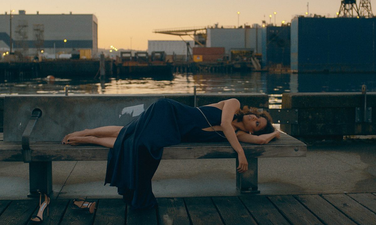 Gugu Mbatha-Raw lies on a bench in Surface.