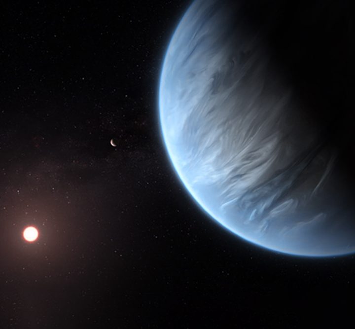 This artist’s impression shows the planet K2-18b, its host star and an accompanying planet in this system.