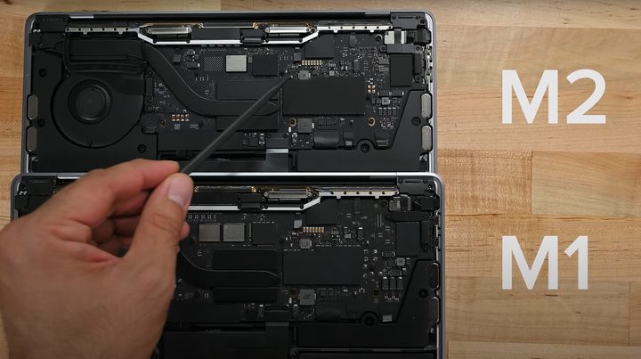 The m2 Macbook Pro on top of the m1 Macbook pro.