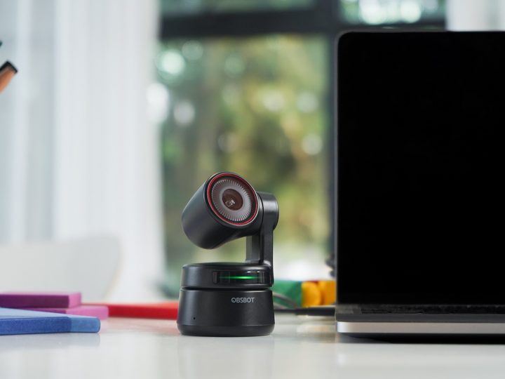OBSBOT Tiny 4K Webcam on desk for remote work.
