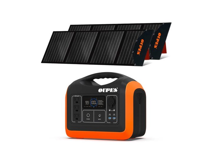 Oupes 1200W portable solar generator with panels nearby.