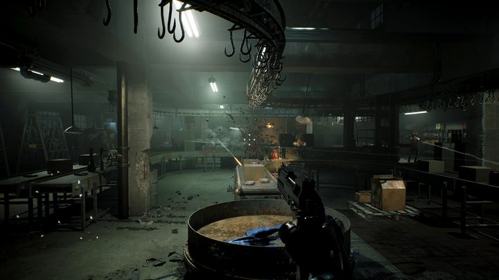 Robocop shooting in a factory.