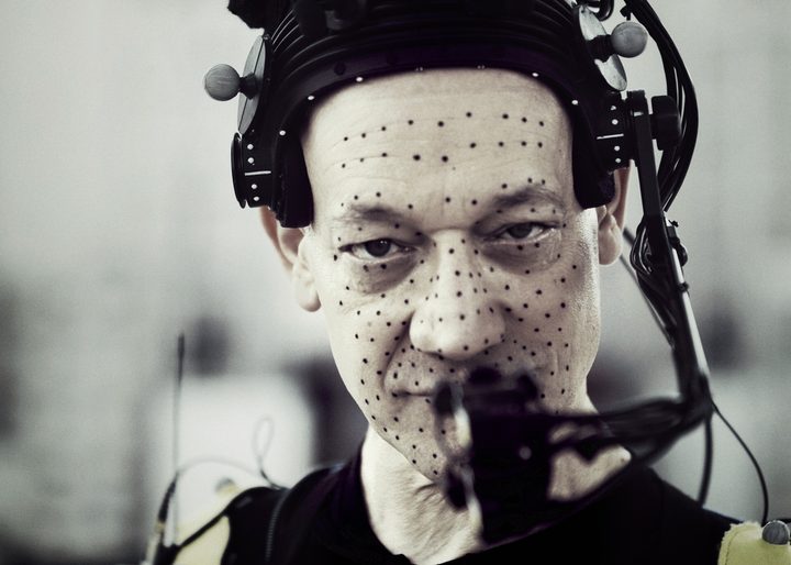Ted Raimi wears a head-mounted camera and stares while filming a scene for The Quarry game.