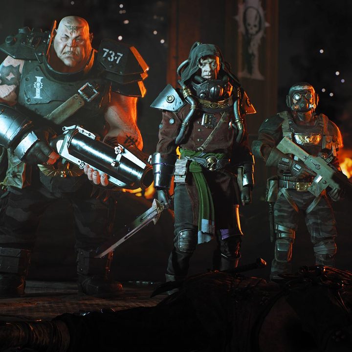 A team of players stands together in Warhammer 40K: Darktide.