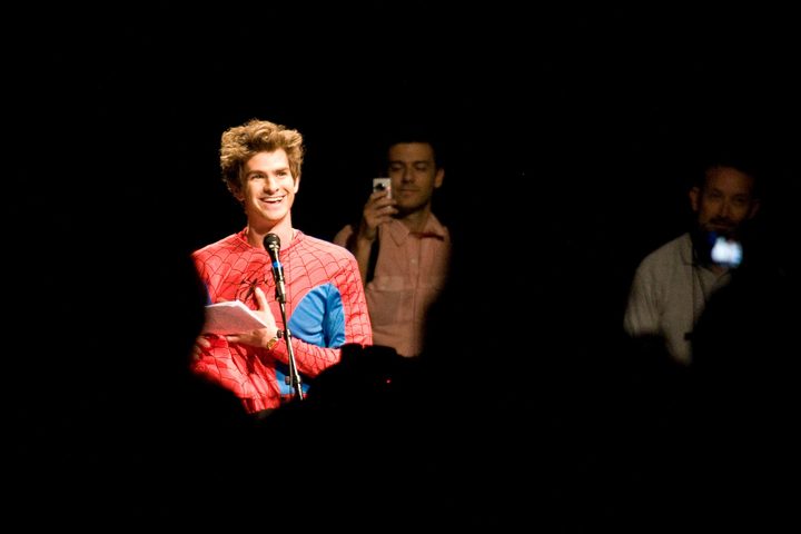 Andrew Garfield poses as Spider-Man at San Diego Comic Con.
