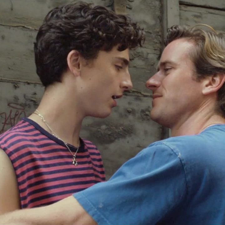 Timothee Chalamet and Armie Hammer hug and look into each other's eyes in Call Me By Your Name.