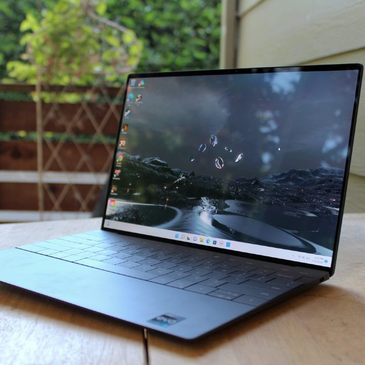 The Dell XPS 13 Plus on a table outside.
