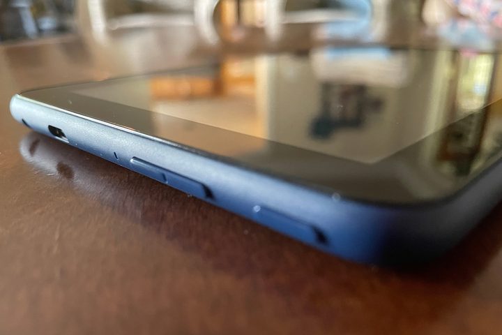 2022 Amazon Fire 7 laying with its redesigned button layout close to the camera.