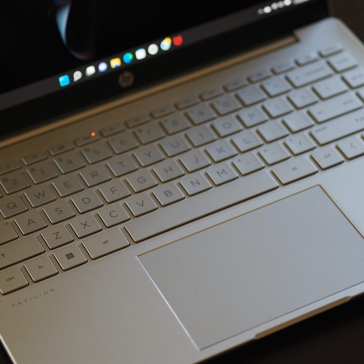 HP Pavilion Plus 14 top down view showing keyboard and touchpad.