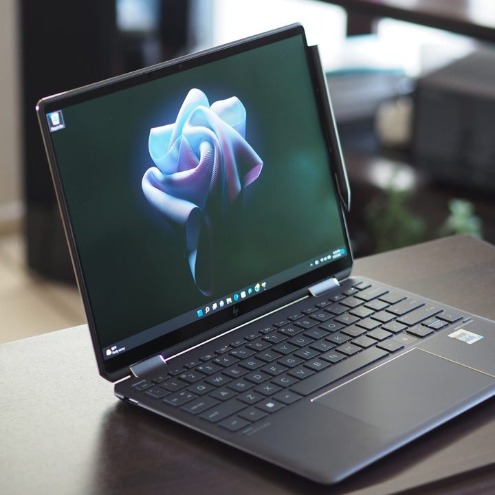 HP Spectre x360 13.5 front angled view showing display and keyboard deck.